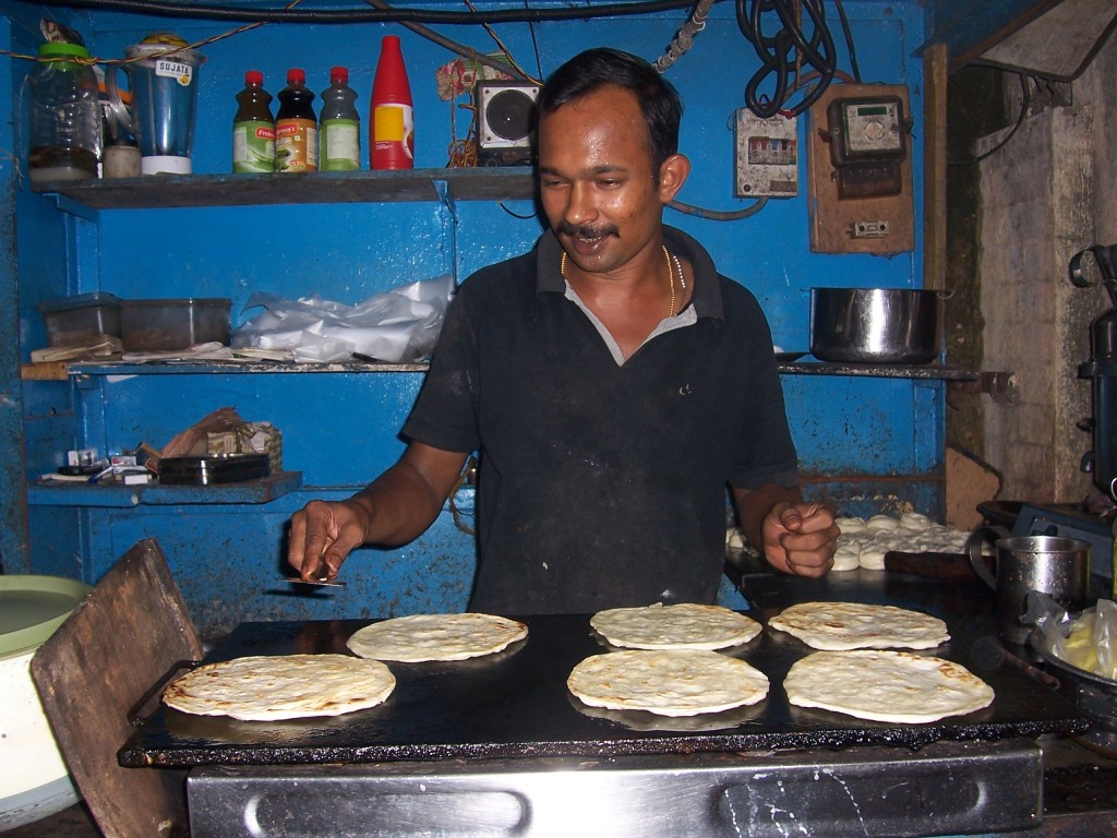 Desayuno indio vendedor de parathas 