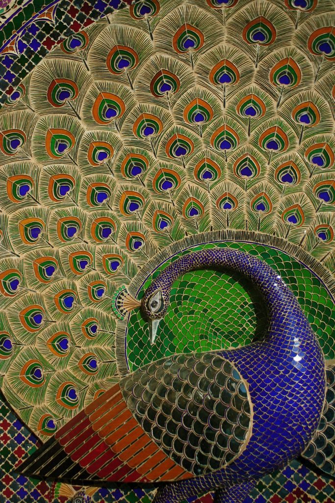 Ecultura de pavo real en el City Palace de Udaipur